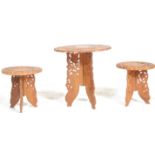 A group of three 20th century carved Anglo Indian occasional / side tables. Each having circular