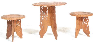 A group of three 20th century carved Anglo Indian occasional / side tables. Each having circular