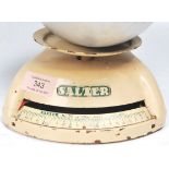 Two sets of vintage retro Salter shop scales both having cream enamels with green lettering,