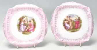 Carl Tielsch Altwasser - Silesia - A pair of 19th Century German porcelain pot stands having pink