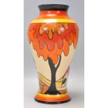 Clarice Cliff- House and Bridge - A 1930's Clarice Cliff Fantasque baluster vase hand painted with a