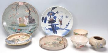 A collection of Japanese antique ceramics to include a 19th Century blue and white hand painted
