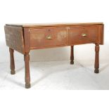 A Victorian 19th century country pine scullery table. Raised on turned and inverted tapering legs