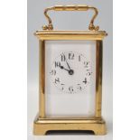 A good quality early 20th century brass cased carriage clock having enamel dial with Roman numeral