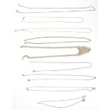 A group of silver necklace chains to include a box link example having a spring ring clasp, three