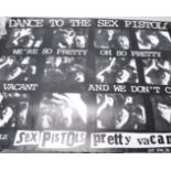 A Sex Pistols advertising music poster for 'Pretty Vacant', with a series of photos.