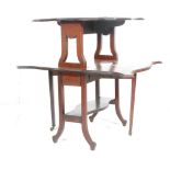 A Victorian mahogany drop leaf two tier Sutherland table set upon square legs united by a tiered