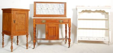A Victorian mahogany and marble tile top washstand table. Raised on turned legs with central