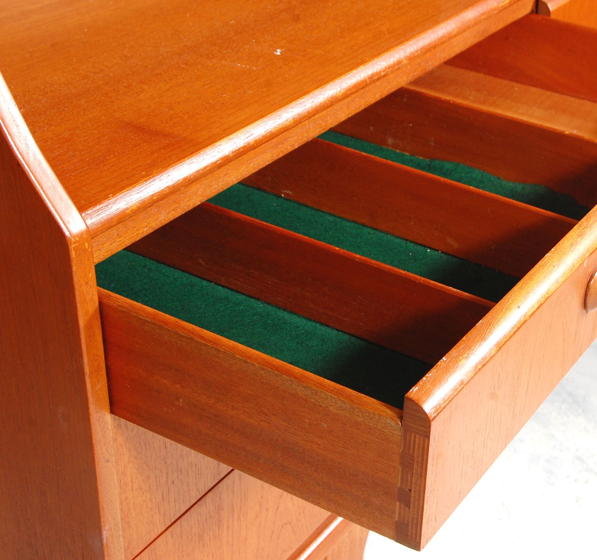 A retro mid 20th Century teak wood sideboard / highboard having a drop down cocktail cabinet to - Image 4 of 10