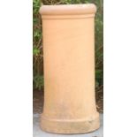 A large 19th Century Victorian stoneware chimney pot of cylindrical form having a curved rim to