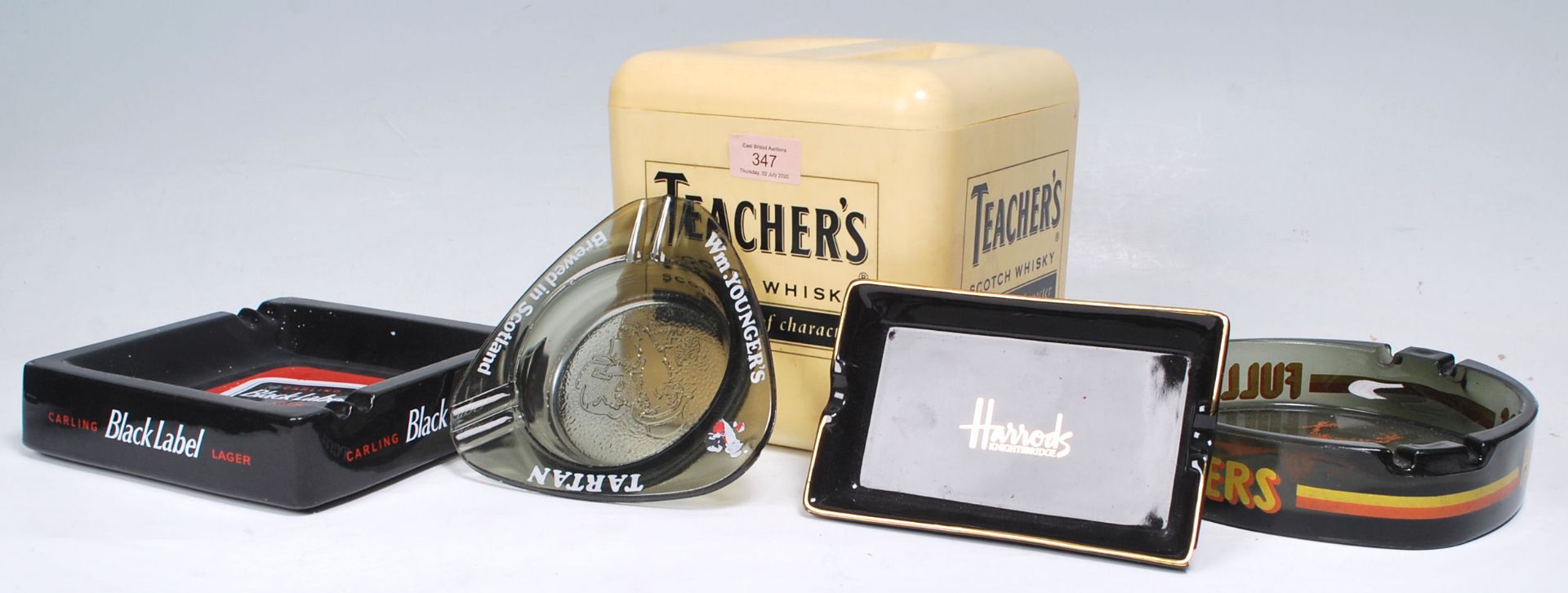 A selection of vintage Brewania pub advertising items to include a Teachers scotch whisky ice