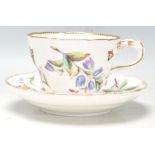 A 19th Century English Meissen style porcelain tea cup and saucer having hand painted floral