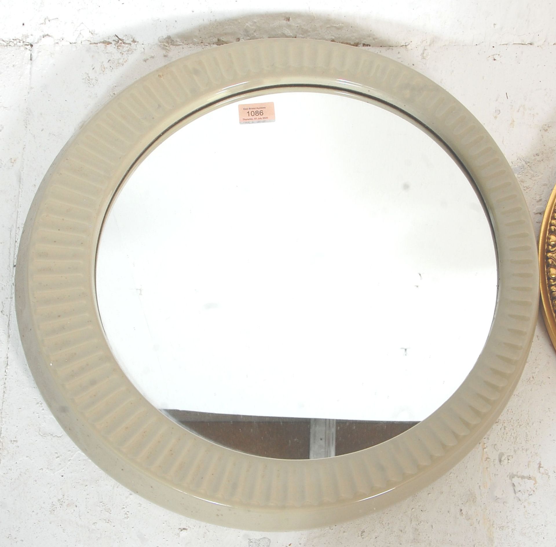 A vintage retro mid 20th Century wall mirror of round form having a ceramic cream coloured famed - Bild 2 aus 4