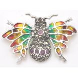 A stamped sterling silver and plique a jour brooch in the form of an insect set with marcasite and