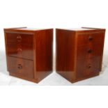 A good pair of retro mid 20th Century teak bedside chests / tables having three graduating drawers