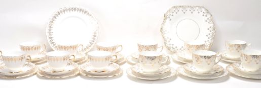 Two Fine Bone China English part tea service one by Pendant Reg No. 749193 and the other by Royal