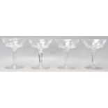 A set of four vintage Waterford crystal cut glass champagne / cocktail glasses having wide faceted