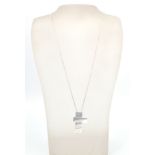 A good Gucci designer silver necklace and chain. The box link chain having a three section silver