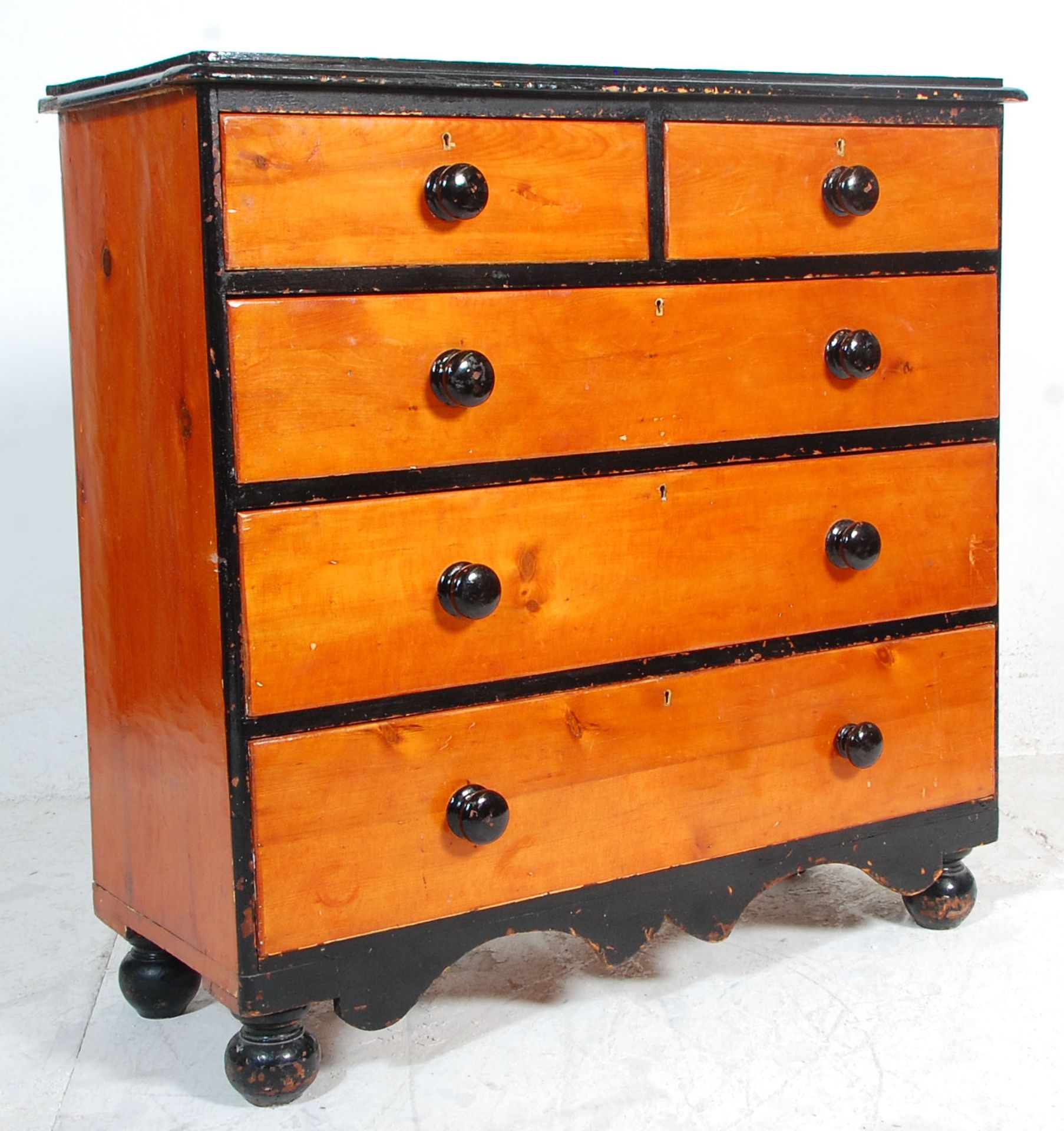 A Victorian 19th century country pine 2 over 3 chest of drawers. Raised on turned legs with 2