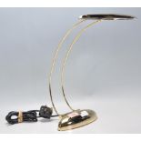 Ross - Model T-121 - A contemporary retro style brass reading lamp having an oval elongated shade