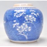 A 19th Century Chinese ginger jar hand painted in the prunus pattern with a key border to the top