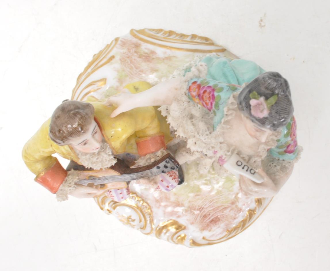 A 20th Century German Meissen / Dresden group figurine in the form of a couple with a seated man - Image 6 of 13