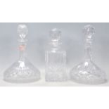 Two vintage 20th Century cut glass ships decanters complete with original faceted stoppers