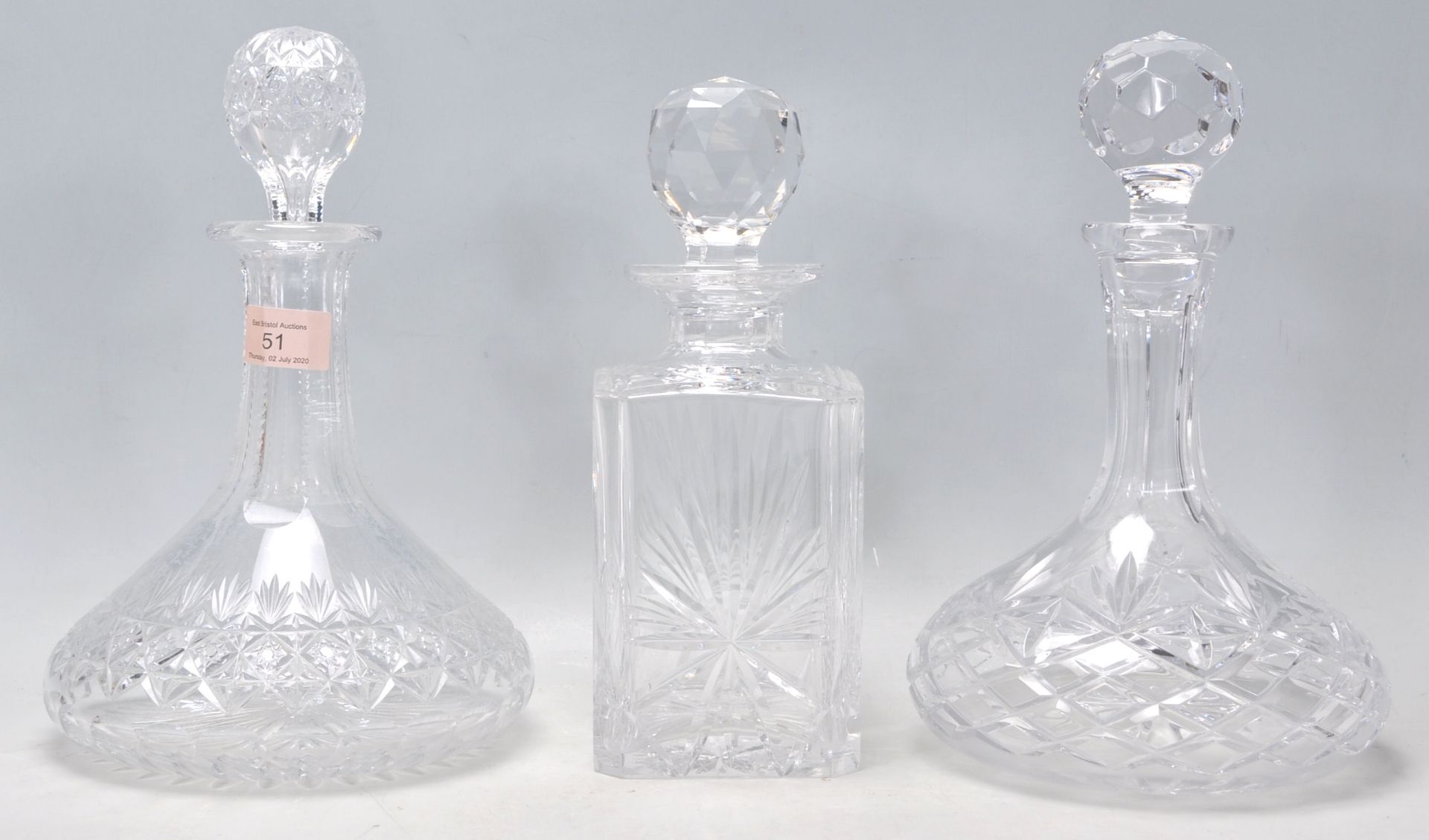 Two vintage 20th Century cut glass ships decanters complete with original faceted stoppers