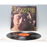 A vinyl long play LP record album by The Doors – 1st Album  – Original Elektra 1st U.K. Press –
