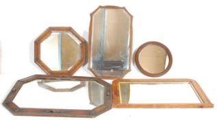 A mixed group of five mirrors dating form the 19th Century to include a Victorian walnut veneered