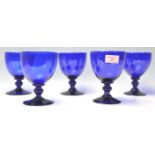 A set of five vintage 20th Century large cobalt blue glass wine glasses / rummers having round bowls