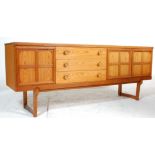 Nathan Furniture - A retro mid 20th Century teak wood sideboard credenza having a central bank of