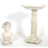 Two 20th Century reconstituted stone garden ornaments to include a classical style bird table in the