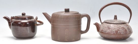 A collection of 3 Chinese Yixing teapots to include brown terracotta glazed example with geometric