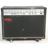 A large H||H Professional Power Guitar Amplifier Model COMBO raised on castors.