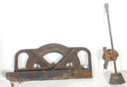 A antique cast iron large wood plane marked with 'Hutchens Patent' with cast iron lever having a