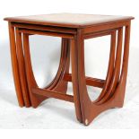 A 1970's G-Plan ' Astro ' teak wood nest of tables. The tables of graduating form with each being