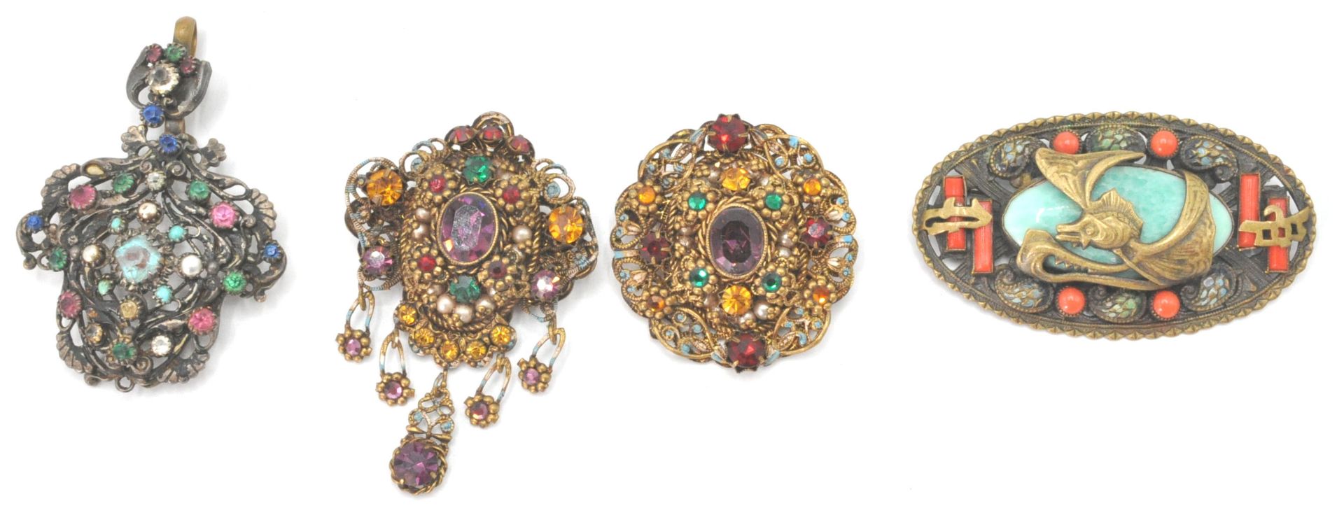 A collection of 1920's Czech Bohemian vintage jewellery to include 2 brooches and a pendant. Also, a