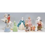 A collection of 20th Century ceramics figurines to include an Austrian Hans Poelzer porcelain