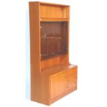 A pair of vintage retro mid 20th Century G Plan style teak wood wall units to include one having a