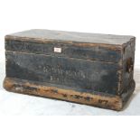 A 1930's vintage tool box containing a wide selection of tools including saws, hand drills,