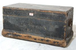 A 1930's vintage tool box containing a wide selection of tools including saws, hand drills,