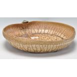 A mid century studio pottery centre piece bowl - fruit bowl having drip glaze decoration with