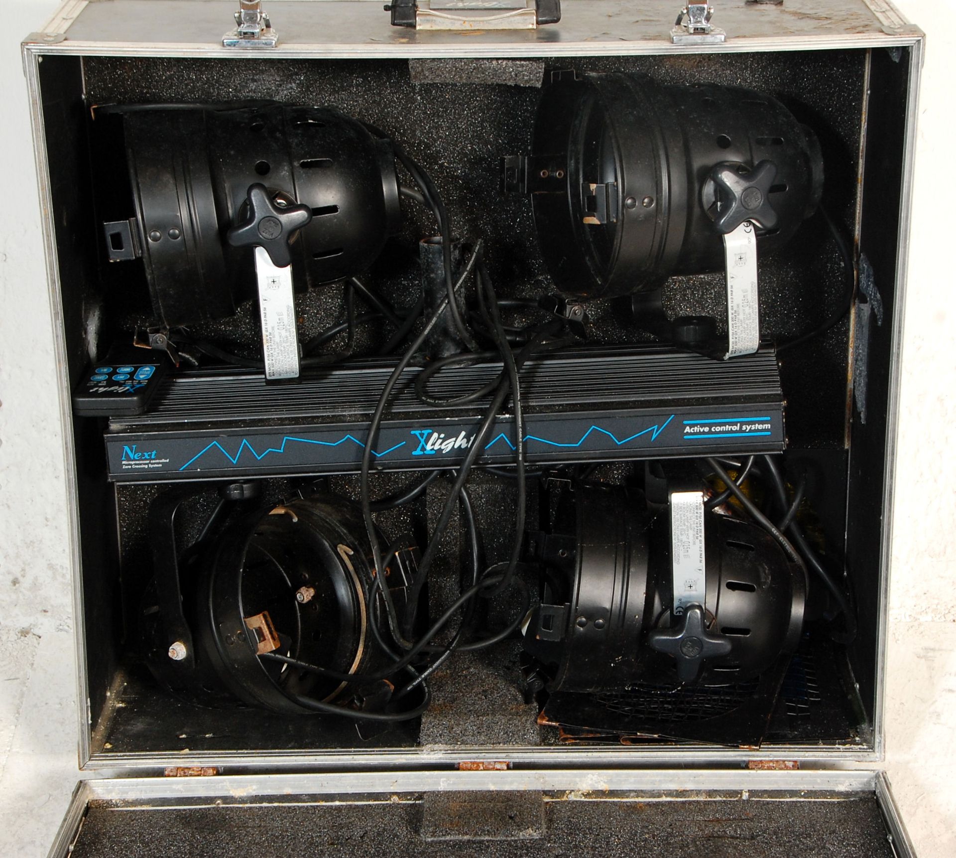DJ Equipment - A cased Xlight Active Control System having four adjustable lights. Marked 'Next - Bild 2 aus 4