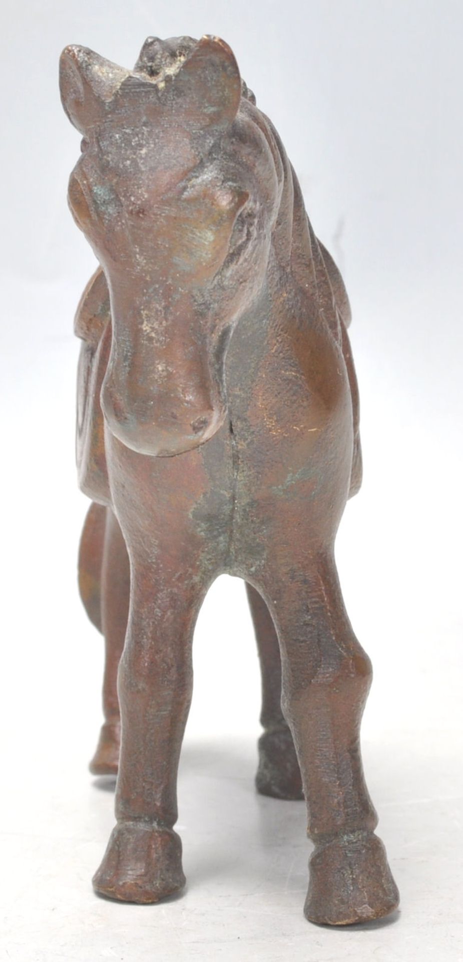 A mid 20th Century cast bronze figure in the form of a horse in a standing position having a - Bild 5 aus 7