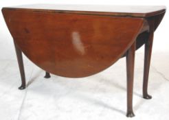 A 19th Century Georgian mahogany pad foot drop leaf gateleg table of oval form.
