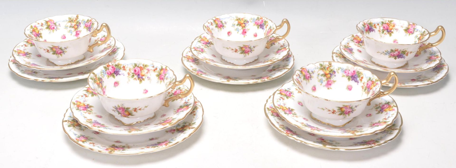 An early 20th Century Edwardian antique Royal Doulton fine bone china tea service decorated with