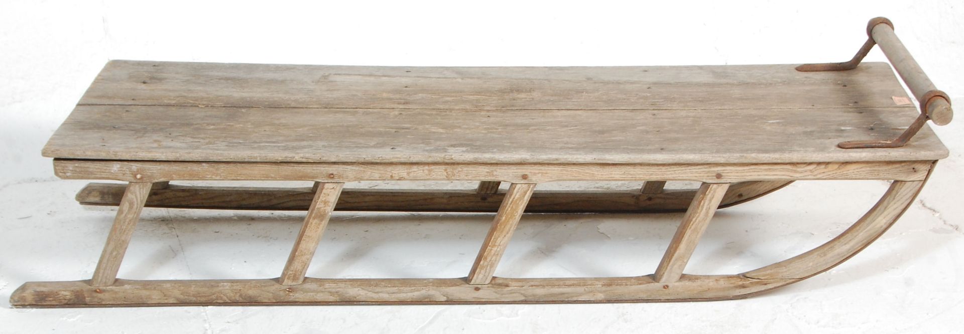 A vintage 20th Century scrubbed wooden sledge / sled / sleigh having a turned handle to the top - Bild 2 aus 5