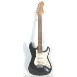 A Fender Stratocaster style Encore six string electric guitar having three control knobs with a