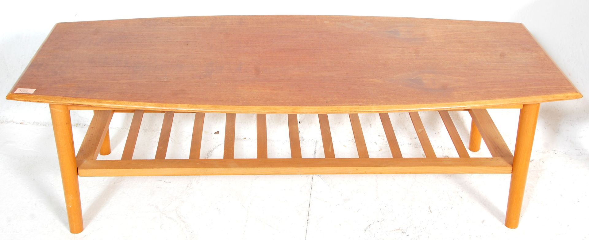 A retro 20th Century Danish inspired surfboard top teak coffee table raised on tapering legs with - Bild 3 aus 5